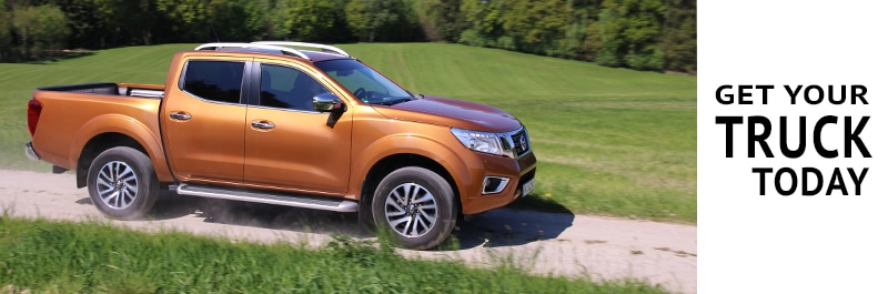 Nissan-truck-on-dirt-road-Best-Trucks-for-Sale